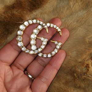 Double GG Brooch